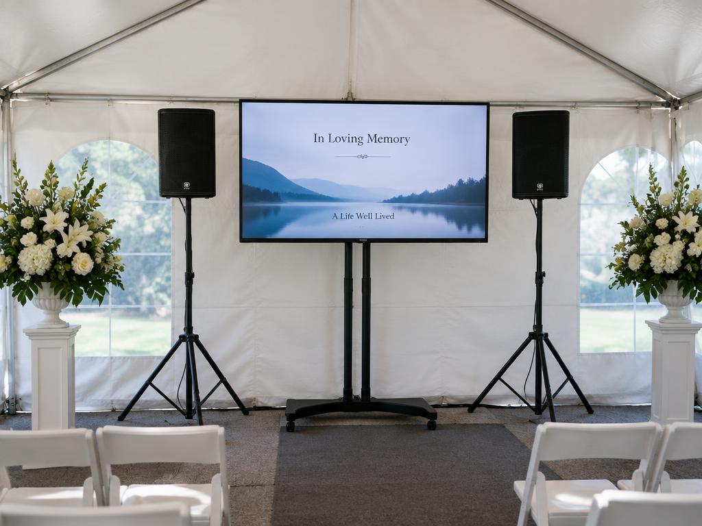 Sound system and TV screen set up for a memorial service